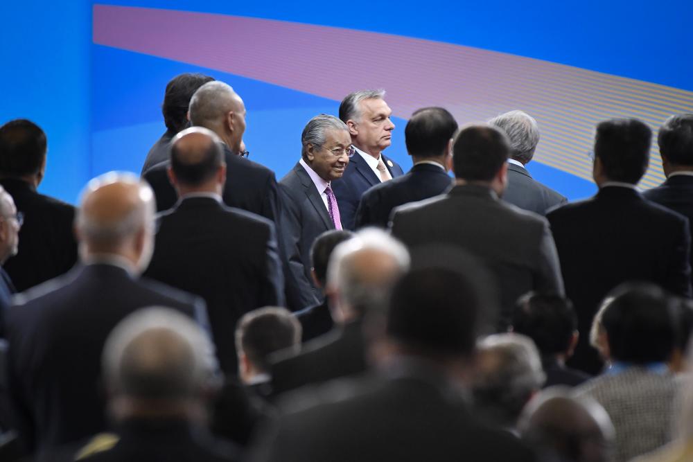 Prime Minister Tun Dr Mahathir Mohamad (C) together with the thirty-seven world leaders arrives for the opening of the Second Belt and Road Forum for International Cooperation at the National Convention Centre of China, on April 26, 2019. — Bernama