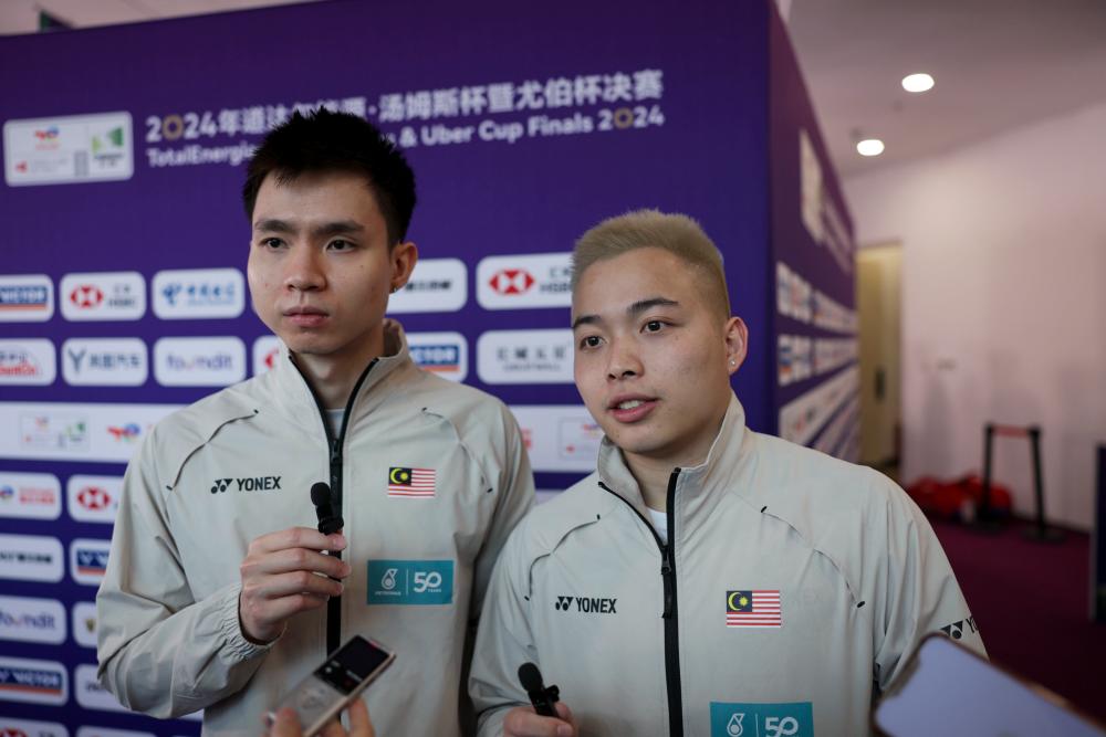 Team captain and men’s doubles player, Soh Wooi Yik (left). - BERNAMAPIX