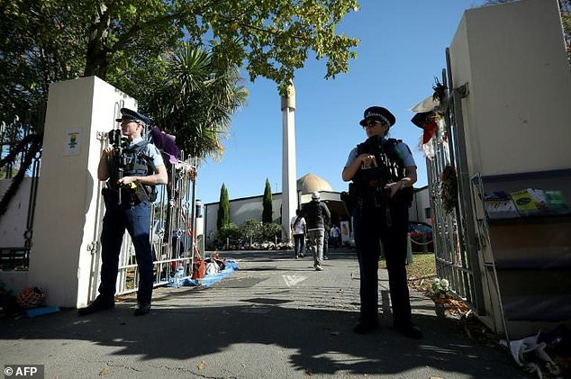 Armed police stand guard outside the Al Noor mosque in Christchurch, where most of the victims of a mass shooting on March 15 died. — AFP
