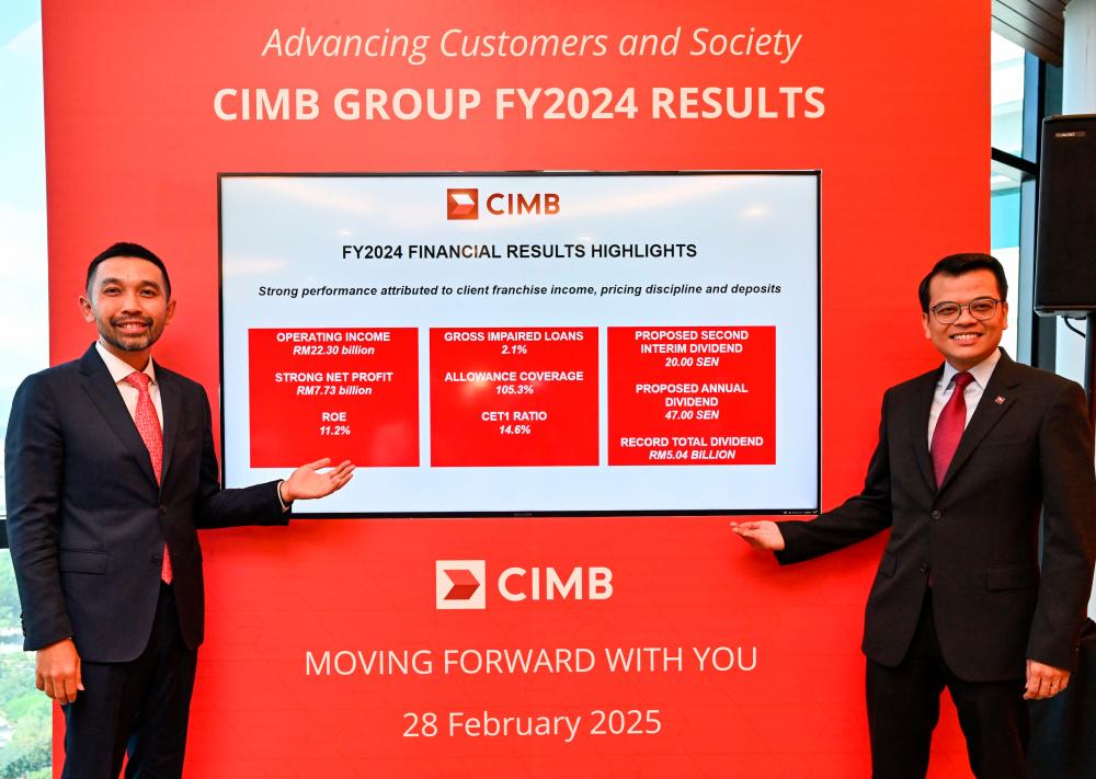 Novan (left) and CIMB Group chief financial and strategy officer Khairul Rifaie at a press conference on the banking group’s FY24 financial results.