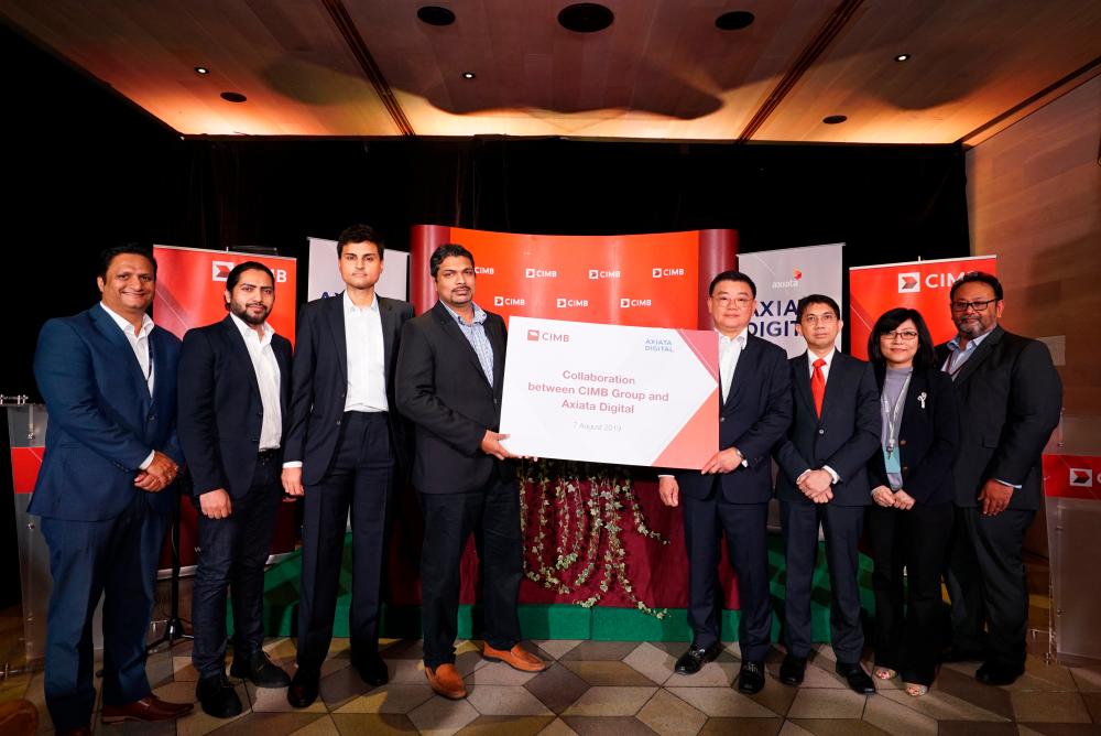(From left) ADC director of business development &amp; operations Ankur Jakhwal, director of marketing, customer experience &amp; innovation Manzur Rahman, head of strategy &amp; partnerships Gurpreet Khera, Sheyantha, Lee, CIMB group commercial banking deputy CEO Ahmad Shazli Kamarulzaman, head regional digital &amp; ecosystem Alice Wong and director regional digital &amp; ecosystem Annuar Aziz.