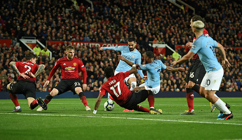 Manchester City’s Raheem Sterling (3R) shoots but fails to score during their EPL match against Manchester United at Old Trafford in Manchester, on April 24, 2019. — AFP