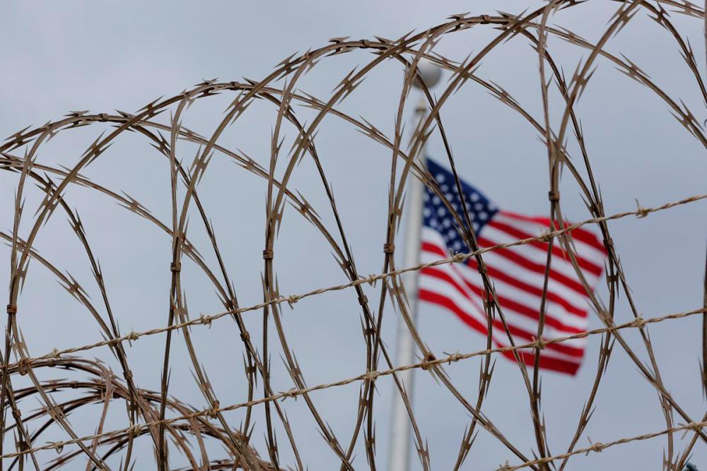 The United States flag flies inside of Joint Task Force Guantanamo Camp VI at the U.S. naval base in Guantanamo Bay, Cuba, March 22, 2016. -REUTERSPix