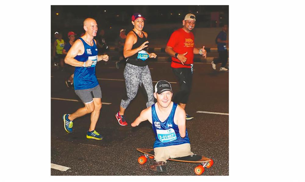 Koch in action at the marathon. – Photo courtesy of Dirigo Events