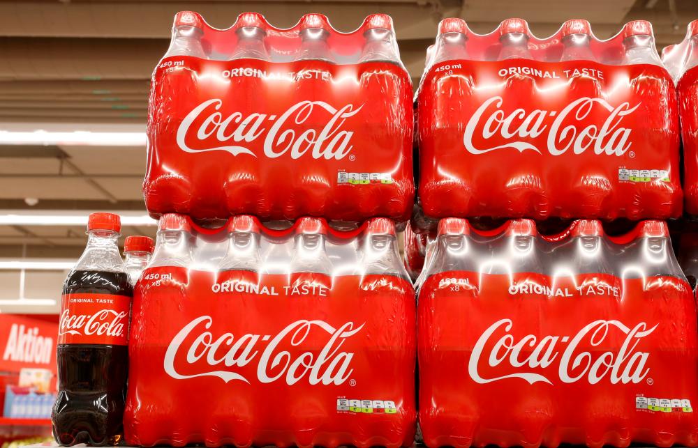 Bottles of Coca-Cola are displayed at a supermarket of Swiss retailer Denner in Glattbrugg, Switzerland. – REUTERSPIX