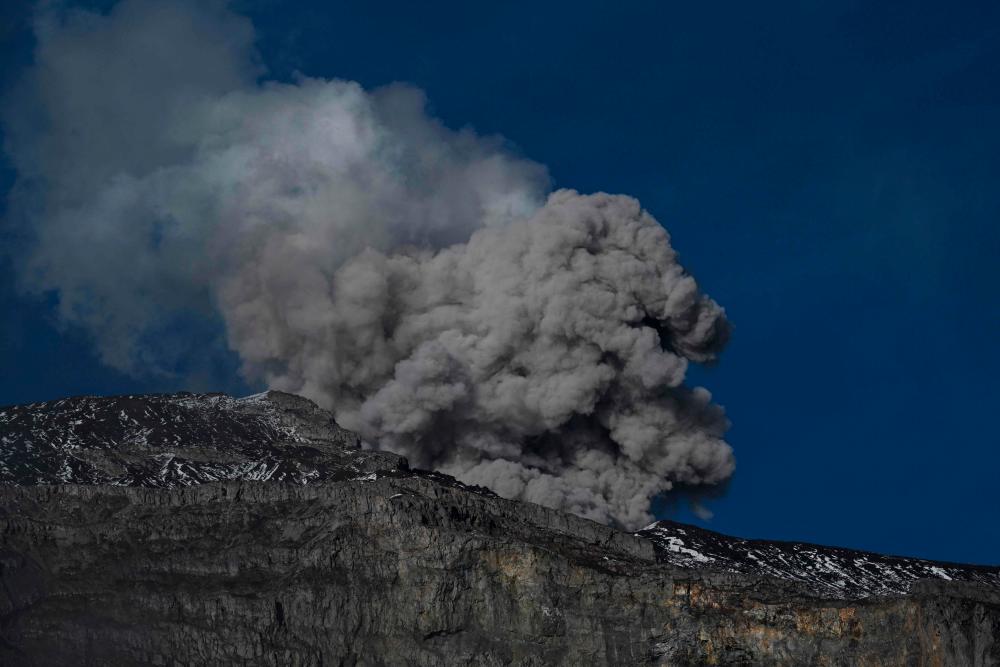 The Nevado del Ruiz volcano emits a cloud of ash in Murillo, Tolima Department, Colombia on April 7, 2023. AFPPIX