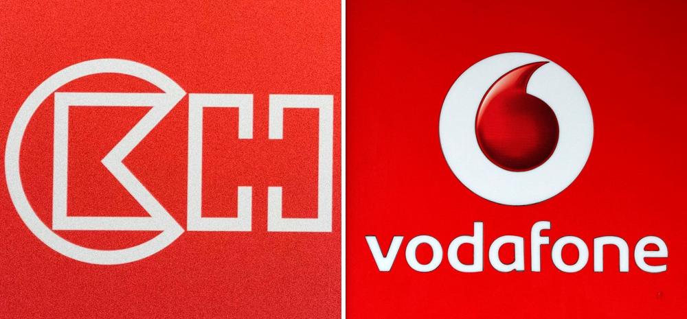 Combination of file pictures shows the logo of CK Hutchison and a Vodafone logo. Vodafone has agreed to merge its British operations with rival Three UK, owned by Hong Kong-based CK Hutchison. – AFPpic