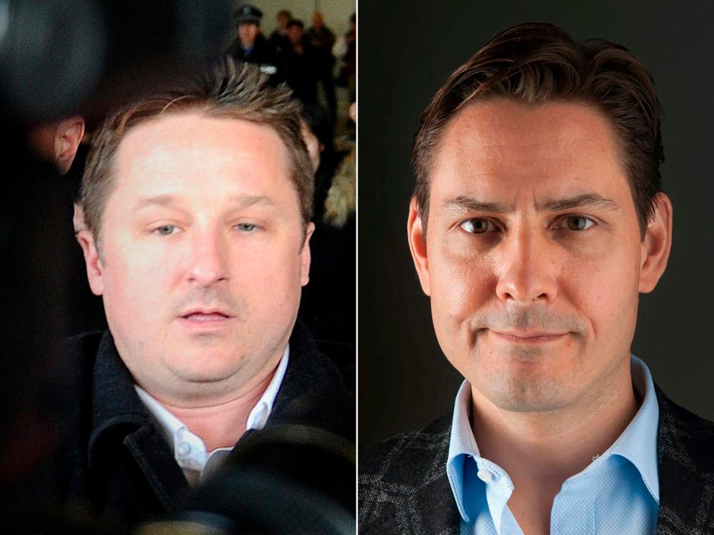 This combination of file pictures created on September 24, 2021 shows Canadian businessman Michael Spavor (L) and former Canadian diplomat Michael Kovrig. AFPpix