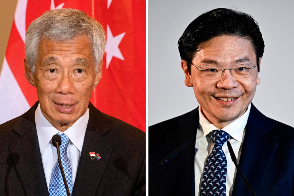 Lee Hsien Loong (kiri) dan Lawrence Wong/AFPPix
