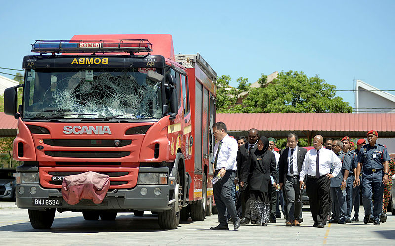 Filepix of the coroner’s visit to the site of the Seafield temple riots during the inquest into the death of fireman Muhammad Adib Mohd Kassim. — Bernama