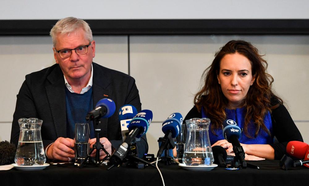 Icelandic journalist Kristinn Hrafnsson, Editor-in-Chief of Wikileaks (L) and Julian Assange's partner Stella Moris attend a briefing with members of the media in London/AFPPix