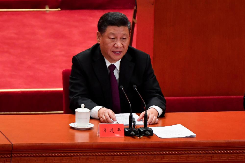 China's President Xi Jinping gives a speech during a celebration meeting marking the 40th anniversary of China's reform and opening up at the Great Hall of the People in Beijing on Dec 18, 2018. — AFP