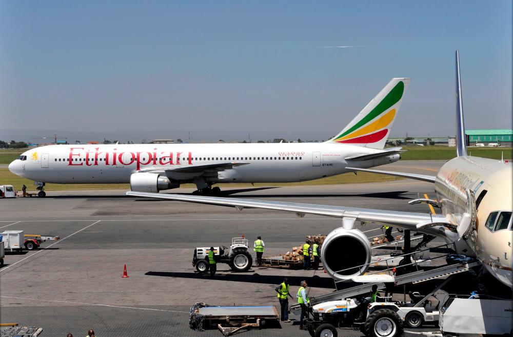 This file photograph taken on Jan 26, 2010, shows an Ethiopian Boeing 777 aircraft as it leaves a hanger in Nairobi. — AFP
