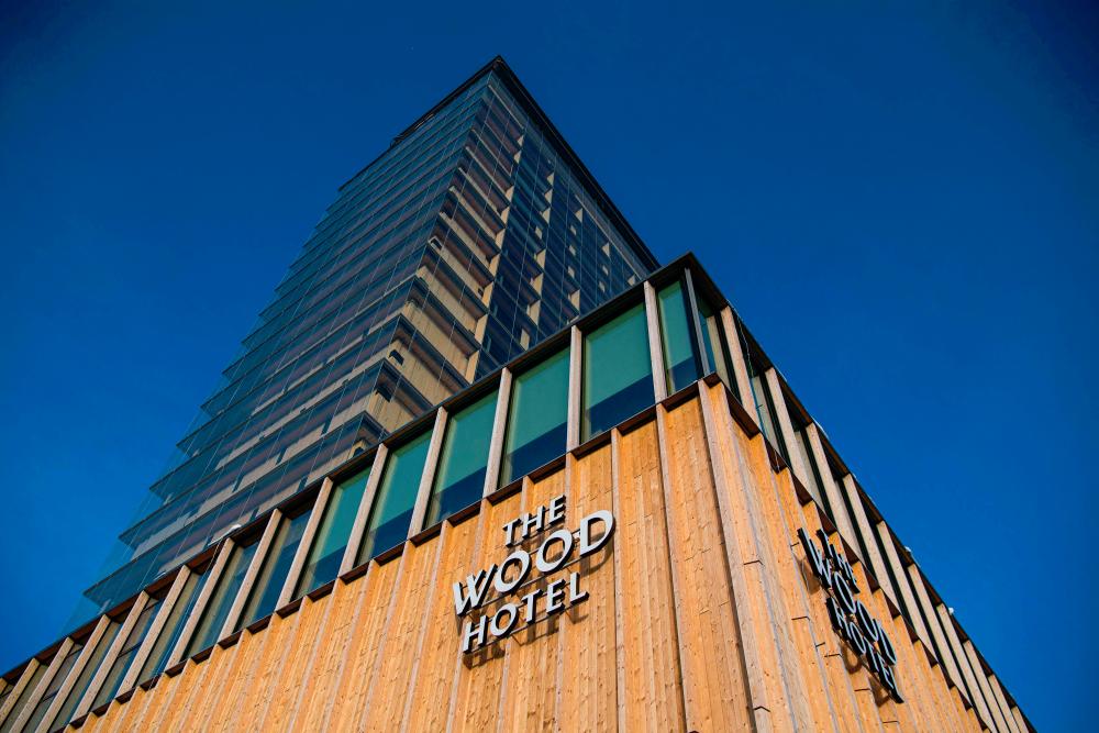 The Sara culture house, one of the world’s tallest wooden buildings with 20 floors, is pictured on February 22, 2022, in Skelleftea, in Vasterbotten county. - AFPpix