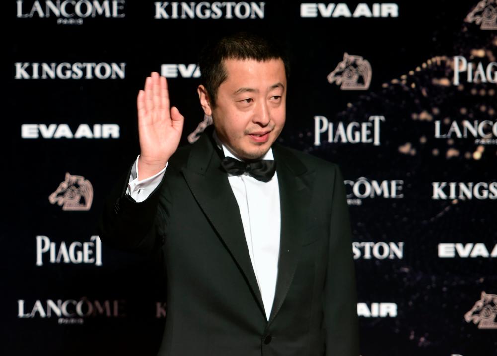 Hong Kong actor Jia Zhangke arrives for the 52nd Golden Horse Film Awards in Taipei on November 21, 2015. — AFP