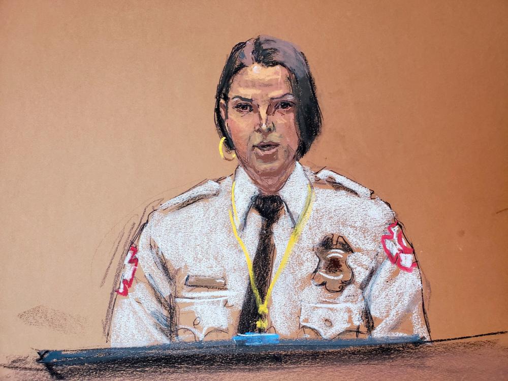 Fire department emergency medical technician (EMT) Genevieve Hansen answers questions on the second day of the trial of former Minneapolis police officer Derek Chauvin for second-degree murder, third-degree murder and second-degree manslaughter in the death of George Floyd in Minneapolis, Minnesota, U.S. March 30, 2021 in this courtroom sketch from a video feed of the proceedings. — Reuters