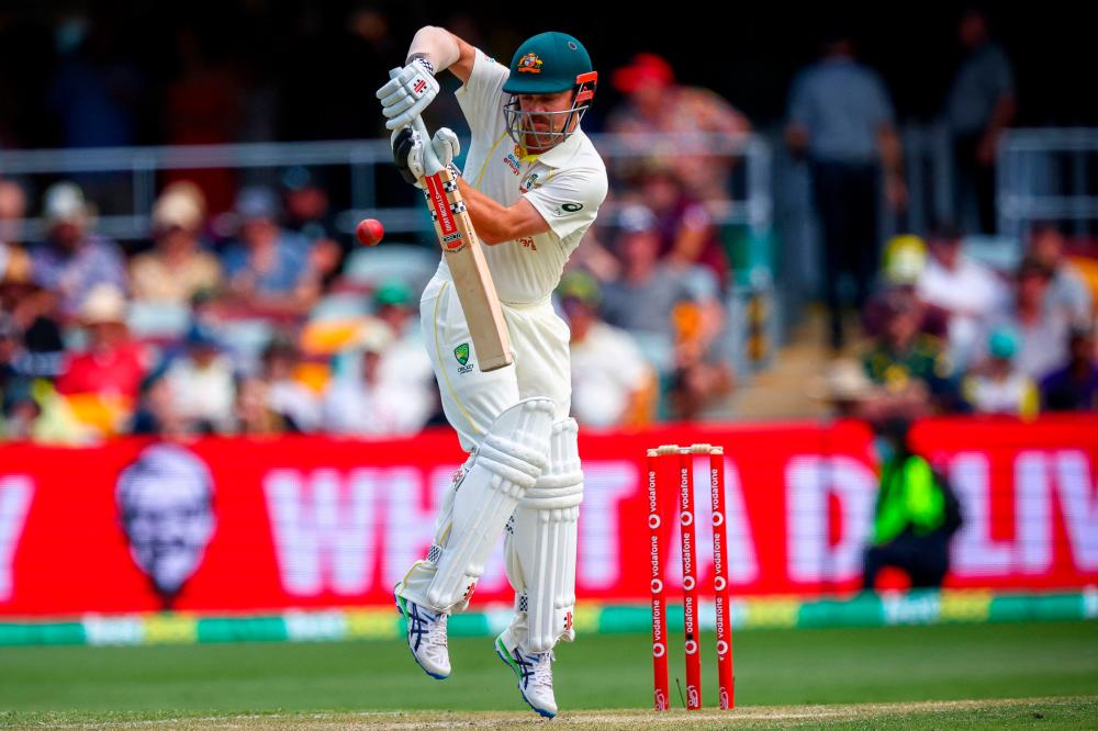 Australia's Travis Head plays a defensive shot during day two of the first Ashes cricket Test match between England and Australia at the Gabba in Brisbane on December 9, 2021. AFPpix