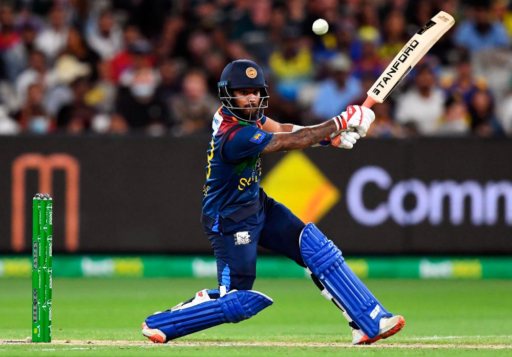 Sri Lanka batsman Kusal Mendis hits out against the Australian bowling during the fifth Twenty20 international cricket match at the Melbourne Cricket Ground (MCG) on February 20, 2022. AFPPIX