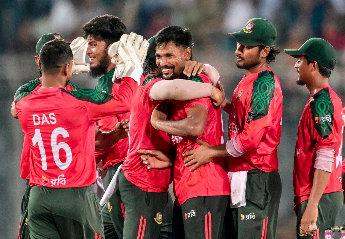 Bangladesh's players celebrate their team's win at the end of the second Twenty20 international cricket match between Bangladesh and Pakistan at the Sher-e-Bangla National Cricket Stadium in Dhaka on July 22, 2025. - AFPPIX