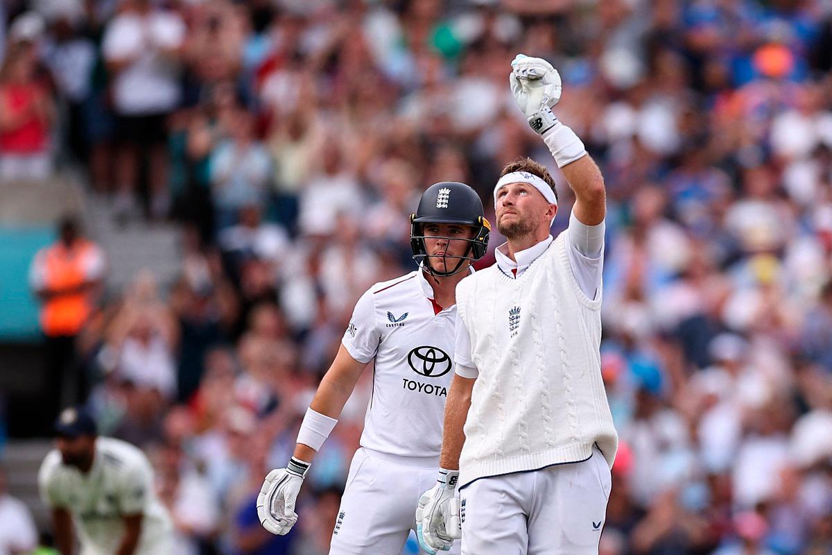England’s Joe Root celebrates getting his 100 on day four of the fifth Test cricket match between England and India at The Oval in London on August 3, 2025. - HENRY NICHOLLS / AFP