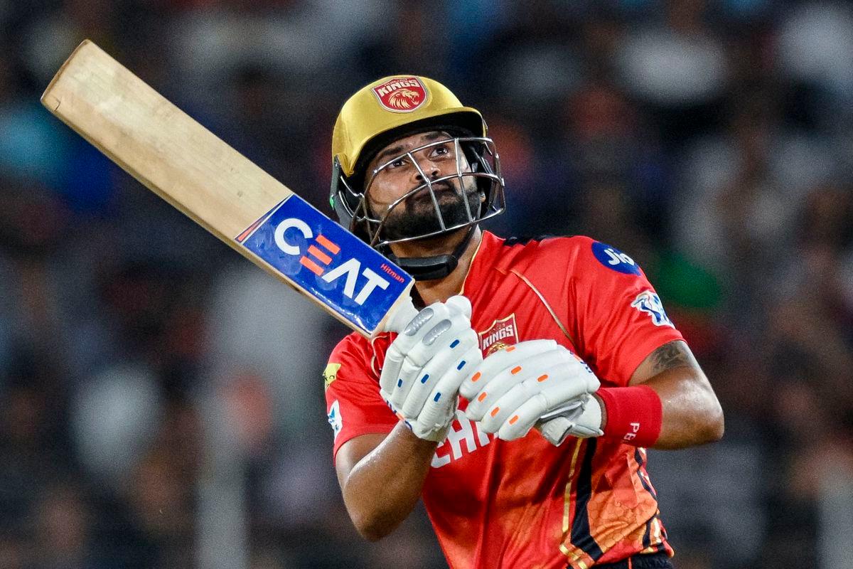 Punjab Kings’ captain Shreyas Iyer watches the ball after playing a shot during the Indian Premier League (IPL) Twenty20 second Qualifier cricket match between Punjab Kings and Mumbai Indians at the Narendra Modi Stadium in Ahmedabad on June 2, 2025. (Photo by Arun SANKAR / AFP) / -