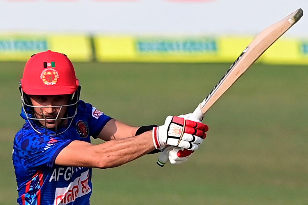 Afghanistan’s Rahmanullah Gurbaz plays a shot during the third one-day international (ODI) cricket match between Afghanistan and Bangladesh at the Zahur Ahmed Chowdhury Stadium in Chittagong on February 28, 2022. AFPPIX