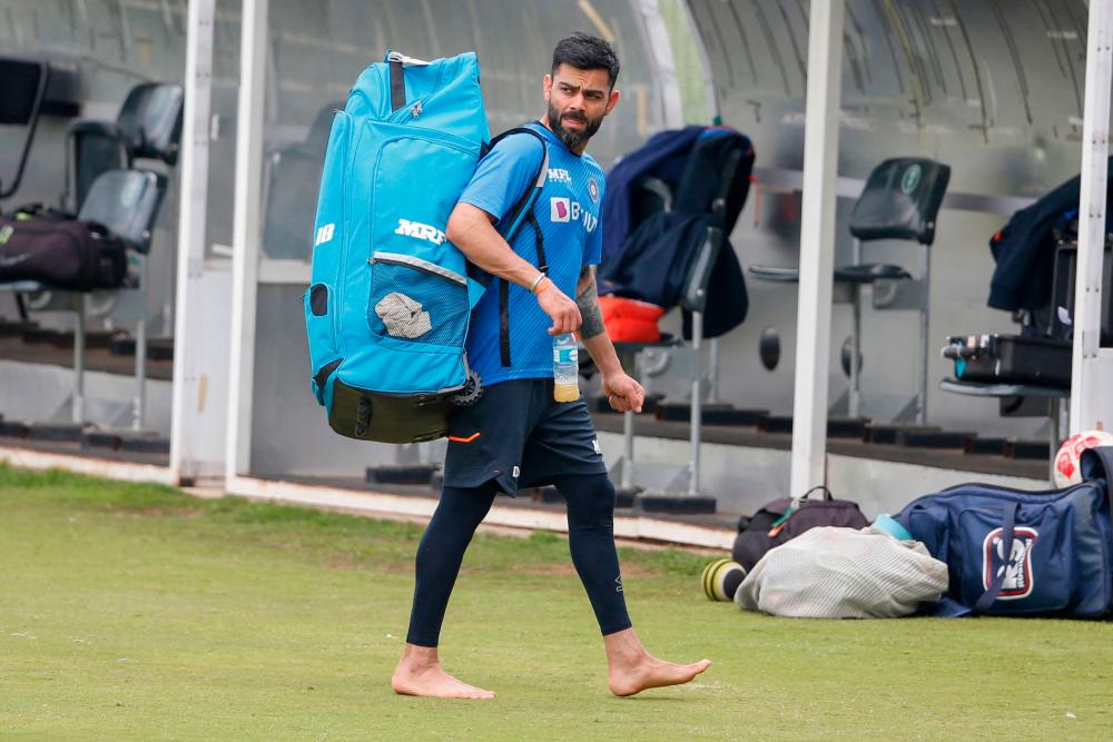 India's Virat Kohli leaves the pitch after training at SuperSport Park in Centurion on December 21, 2021. AFPPIX
