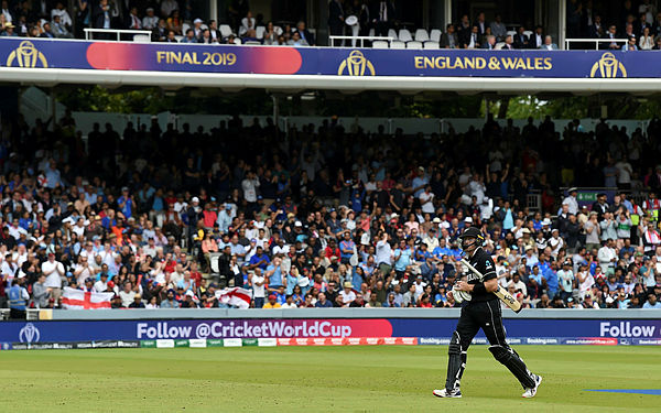 New Zealand’s Martin Guptill walks back to the pavilion after losing his wicket for 19 runs during the 2019 Cricket World Cup final between England and New Zealand at Lord’s Cricket Ground in London on July 14.