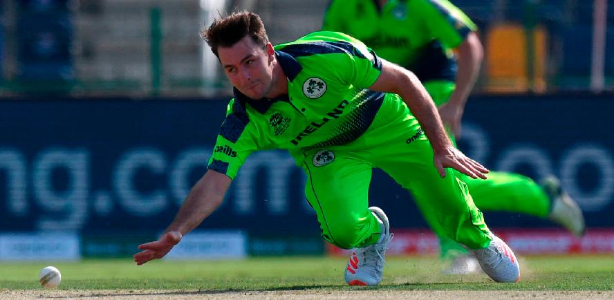 Ireland’s Curtis Campher dives to stop the ball during the ICC men’s Twenty20 World Cup cricket match against Netherlands. – AFPPIX