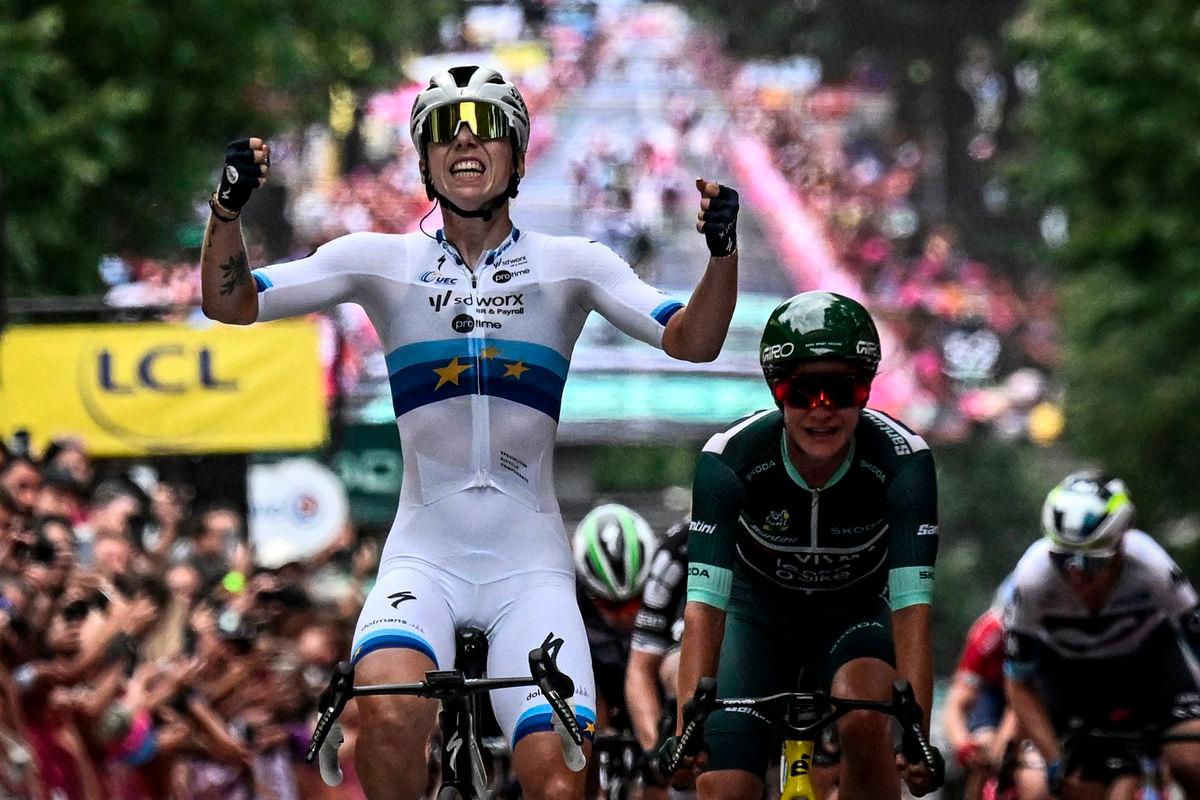 Team SD Worx - Protime’s Dutch rider Lorena Wiebes (L) celebrates as she crosses the finish line to win the 3rd stage (out of 9) of the fourth edition of the Women's Tour de France cycling race, 163.5 km from La Gacilly to Angers, in Angers, western France on July 28, 2025. - AFPPIX