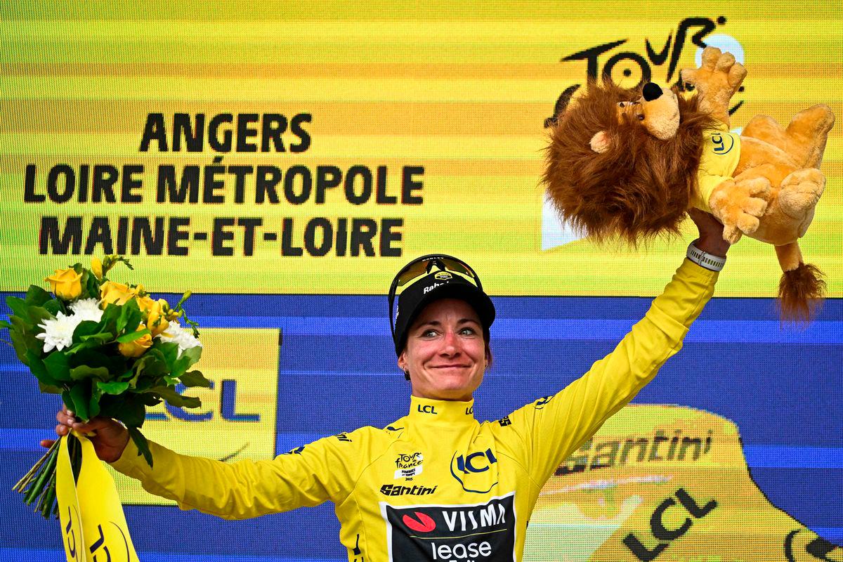 Team Visma | Lease a Bike's Dutch rider Marianne Vos celebrates on the podium with the overall leader's yellow jersey after the 3rd stage (out of 9) of the fourth edition of the Women's Tour de France cycling race, 163.5 km from La Gacilly to Angers, in Angers, western France on July 28, 2025. - AFPPIX