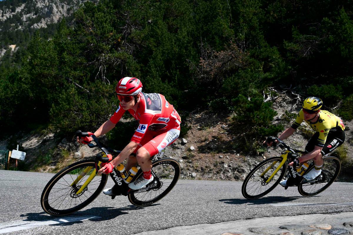 Team Visma-Lease a bike's Danish rider Jonas Vingegaard (L) rides during the fourth stage of the Vuelta a Espana, a 192 km race between Susa and Voiron, in the Alps, on August 26, 2025. - AFPPIX
