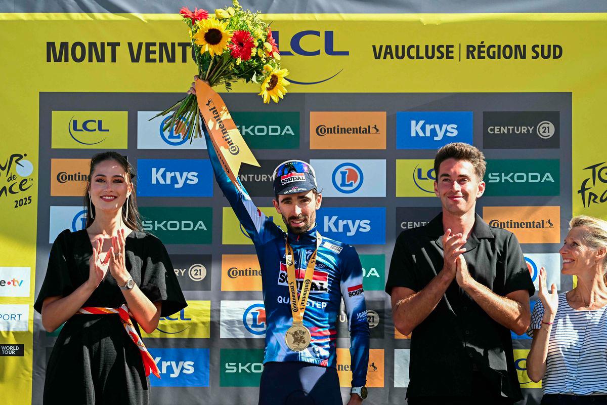 Soudal Quick-Step team's French rider Valentin Paret-Peintre celebrates on the podium after winning the 16th stage of the 112th edition of the Tour de France cycling race, 171.5 km between Montpellier and Mont Ventoux, southern France, on July 22, 2025. - AFPPIX