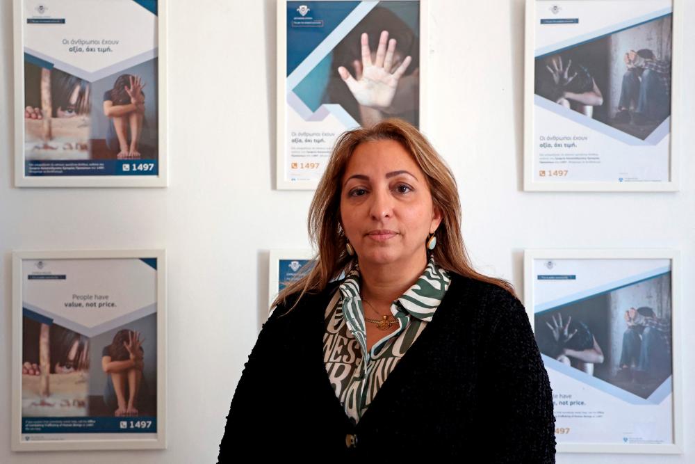 Eleni Michael, head of Cyprus police’s anti-trafficking unit, poses for a picture during an interview with AFP at her office in the Cypriot capital Nicosia, on February 16, 2022. AFPPIX