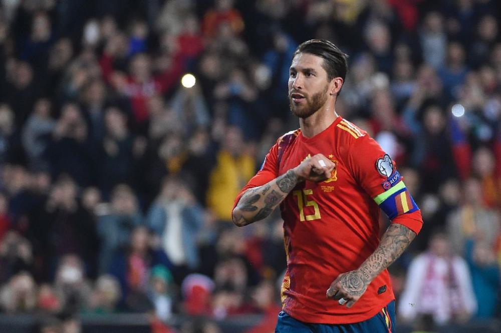 Centre-back Ramos has scored 16 goals for club and country this term. — AFP