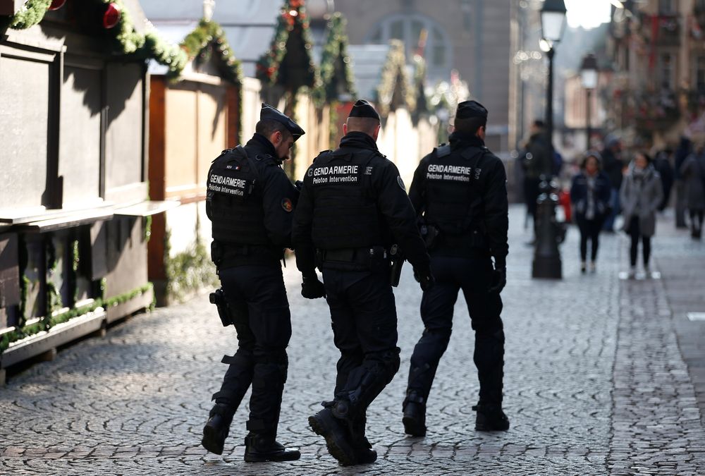 French Gendarmes patrol as they walk by the closed temporary shops at the traditional Christkindelsmaerik (Christ Child market) after a shooting in Strasbourg, France, December 13, 2018. — Reuters