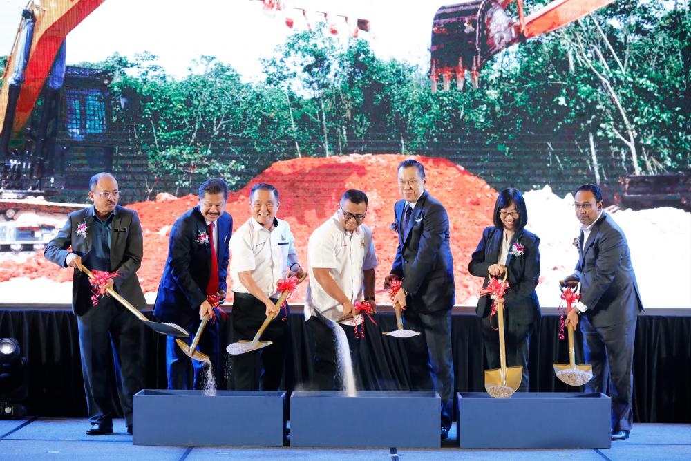 NCT Group founder and group managing director Datuk Seri Yap Ngan Choy (third from left) and Selangor Menteri Besar Datuk Seri Amirudin Shari (fourth from left) at NCT Smart Industrial Park’s ground-breaking ceremony on Friday (April 7).
