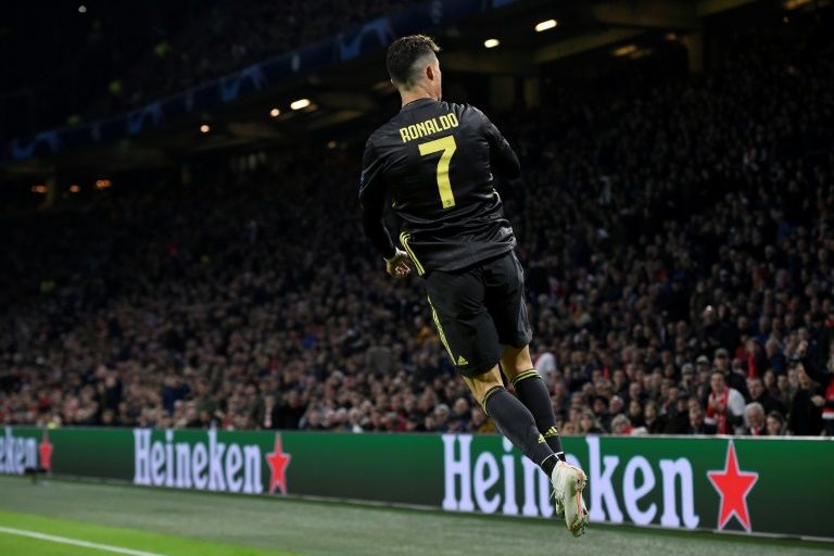 ‘Different level’ Cristiano Ronaldo celebrates after scoring a potentially huge away goal at Ajax on Wednesday. — AFP
