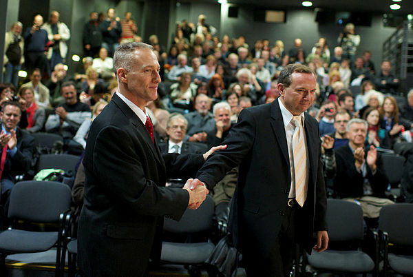 former US Air Force pilot Dale Zelko (L) and former Serbian army officer Zoltan Dani (R) shake hands after the premiere of the documentary “Second Meeting” — AFP