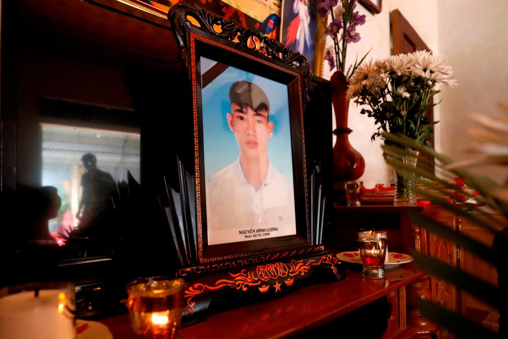 A portrait of Joseph Nguyen Dinh Luong who is one of the suspected victims of the 39 people found dead in a refrigerated truck in Britain is seen at his home in Ha Tinh province, Vietnam October 27, 2019. - Reuters