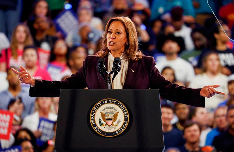 Democratic presidential nominee U.S. Vice President Kamala Harris speaks during her campaign rally with singer Beyonce, in Houston, Texas, U.S., October 25, 2024. - REUTERS/Marco Bello