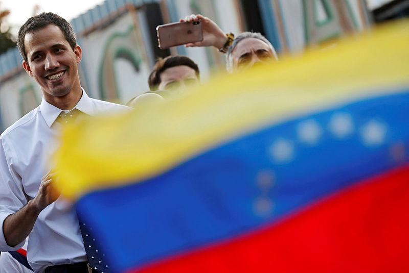 Juan Guaido, President of Venezuela’s National Assembly, smiles during a gathering with supporters in Caracas, Venezuela Jan 19, 2019. — AFP