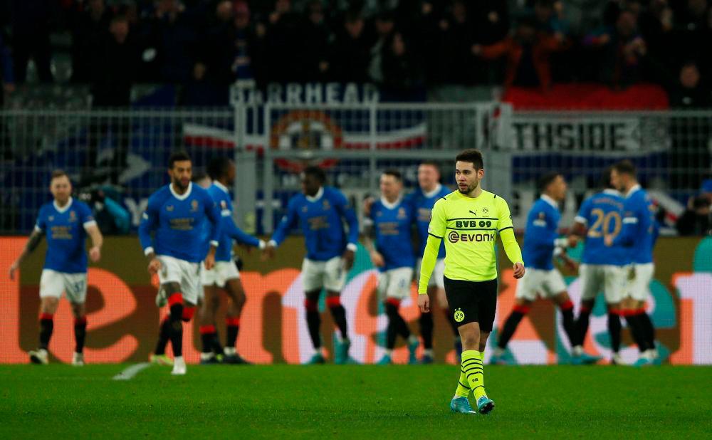 Soccer Football - Europa League - Play Off First Leg - Borussia Dortmund v Rangers - Signal Iduna Park, Dortmund, Germany - February 17, 2022Borussia Dortmund's Raphael Guerreiro looks dejected after Rangers' John Lundstram scores their third goal. REUTERSpix