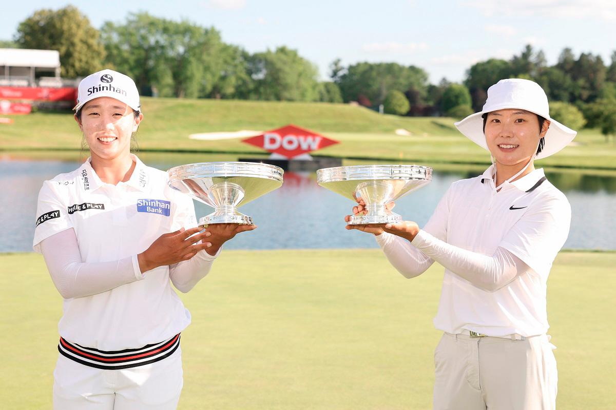 Jin Hee Im (left) and Somi Lee of South Korea pose with their trophies after the final round of the Dow Championship 2025. – GETTY IMAGES