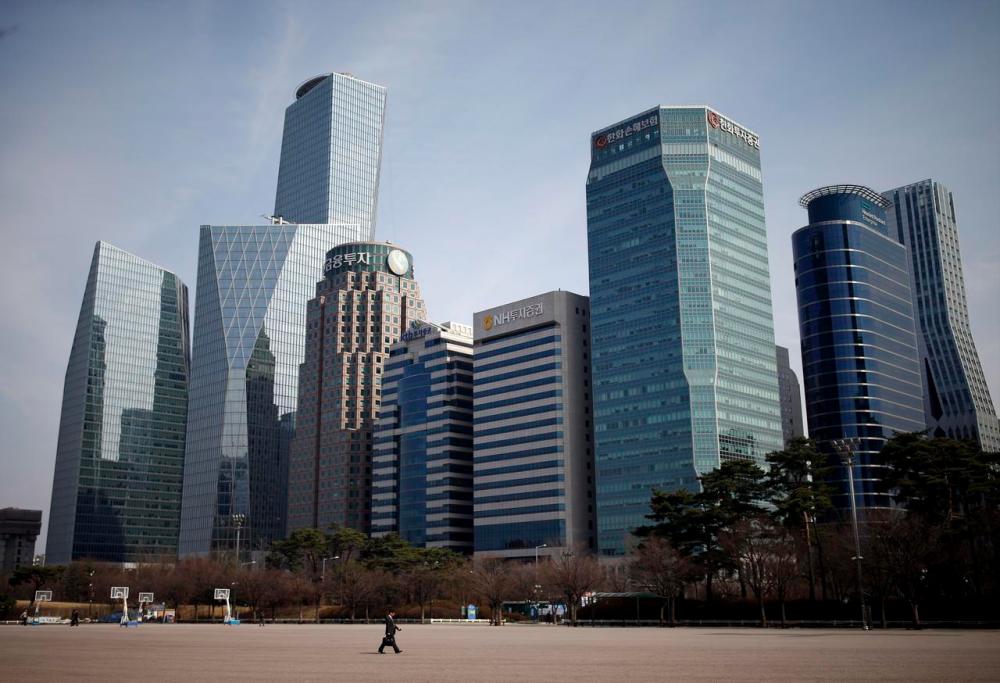 A man walks in a park at a business district in Seoul, South Korea. REUTERSPIX