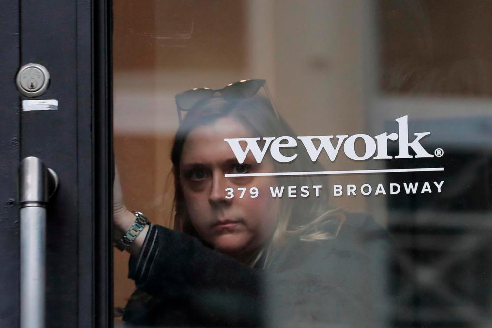 Softbank likely to funnel $1 bln more into WeWork after delayed IPO - FT