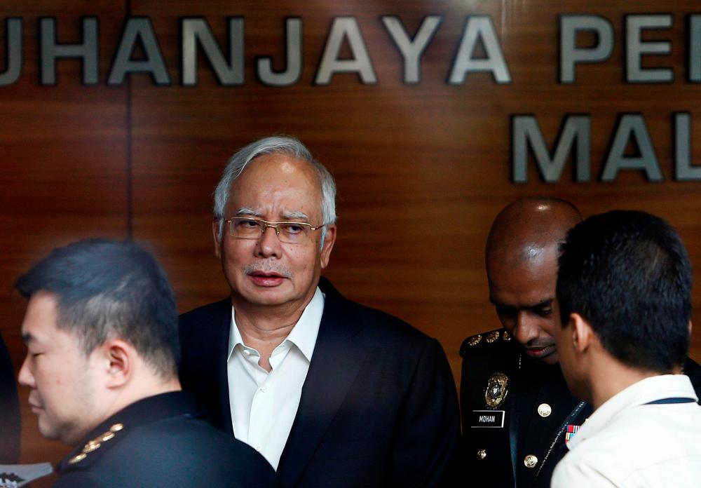 1MDB: Najib attends trial as convicted felon