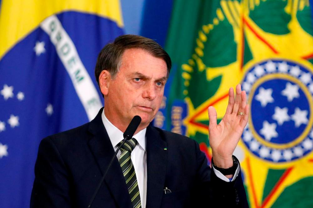 Brazil’s Bolsonaro takes virus test after showing symptoms