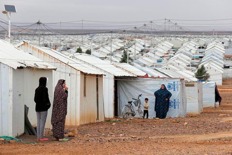 Syrian refugee women stand in front of their homes at Azraq refugee camp, near Al Azraq city, Jordan, December 8, 2018. REUTERSPIX