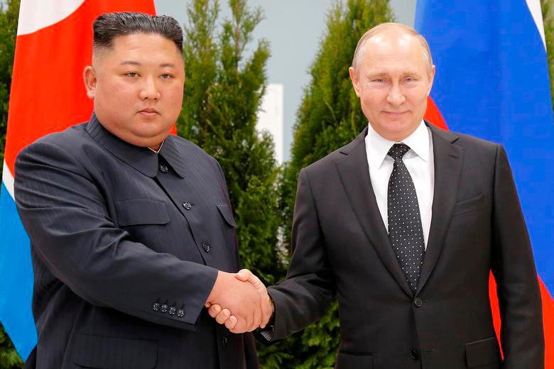 Russian President Vladimir Putin and North Korea’s leader Kim Jong Un shake hands during their meeting in Vladivostok, Russia, April 25, 2019. REUTERSPIX